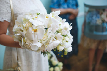 Woman with White Flower Bouquet