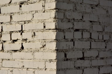 White old worn brick wall texture background.