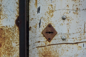 Keyhole in steel rusty door