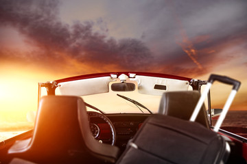 Retro summer car with mood colors of sunset and free space for your decoration. 