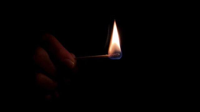 This video shows a burning match with a truly black background for OLED displays.