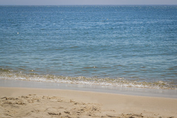 seacoast with the sand in the sunlight