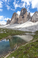 Reflection of the Tre Cime di Lavaredo on a wonderful alpine lake, Dolomites, Italy