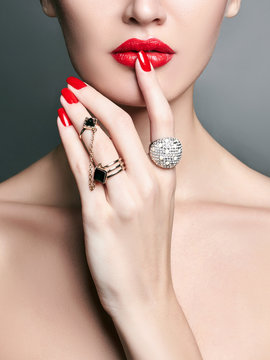 jewelry rings. beauty girl with make-up and manicure