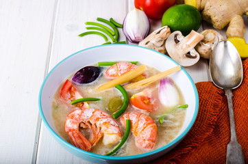 Spicy soup with prawns on coconut milk