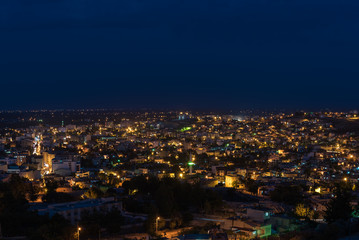Fototapeta na wymiar Night view of Silifke town with blue sky and clouds from hill of silifke castle