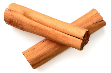 cinnamon sticks isolated on the white background, top view