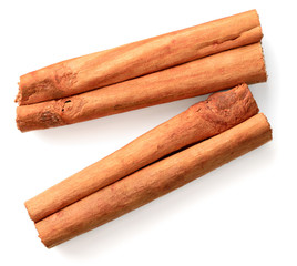 cinnamon sticks isolated on the white background, top view