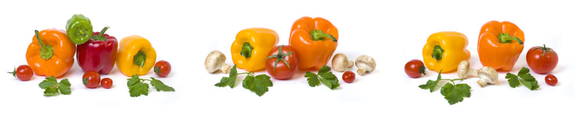 Panoramic view of the red yellow and orange peppers with tomatoes on a white background..Multicolored vegetables in a composition on a white background..