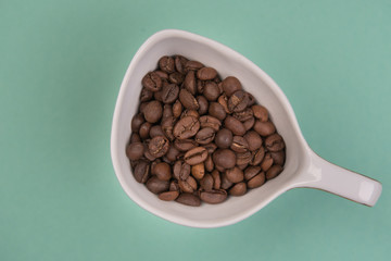 Coffee seeds on a colored background