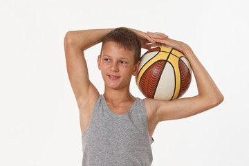 teenager with a basketball on a white background.