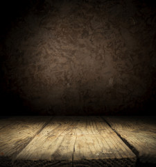 Dark room with tile floor and brick wall background