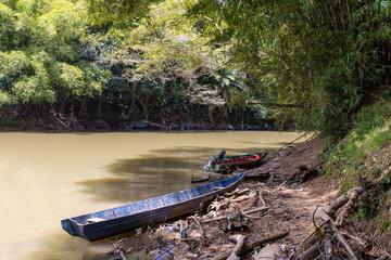 Two native boats at the confluence of Tongod River and Millian River in Tongod, Sabah, Malaysia