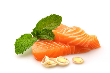 Salmon fillet, peppermint and lemon grass isolated on white background.