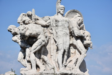 Rome,  marble group on the Vittorio Emanuele II bridge over the Tiber river.