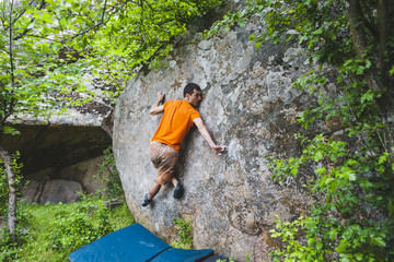 The climber is climbing bouldering.