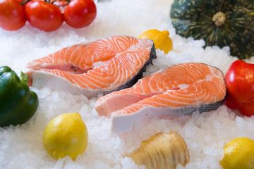 Fresh salmon fillet on ice.