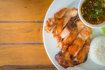 Grilled chicken cut into pieces on a white plate