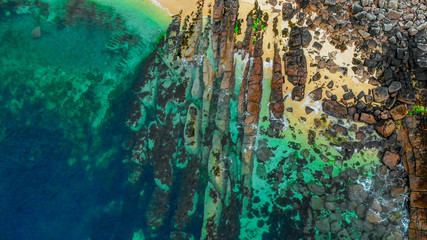 Clear blue ocean water and rocks at the Scottish coastline