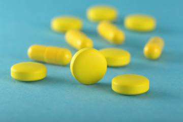 medical pills on a blue background