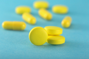 medical pills on a blue background