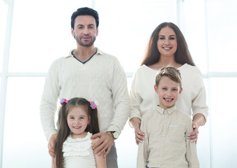 Fototapeta na wymiar portrait of a happy family with small children