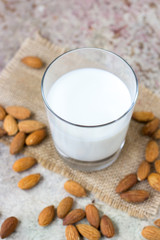 Almond milk in a glass. Organic vegan milk