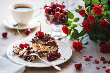 A piece of delicious chocolate meringue cake with hazelnuts