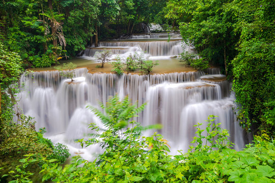 Beautiful waterfall in deep forest, Huay Mae Kamin Waterfall in Kanchanaburi Province, Thailand © Naypong Studio