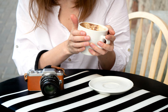 tourist woman digital camera street cafe terrace girl hat sun vintage travel photo shooting white cup coffee panasonic lumix