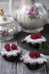 Raspberries cake dessert tea spoon teapot table.
