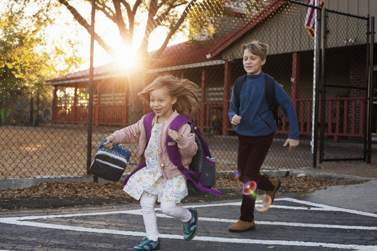 Children running at school