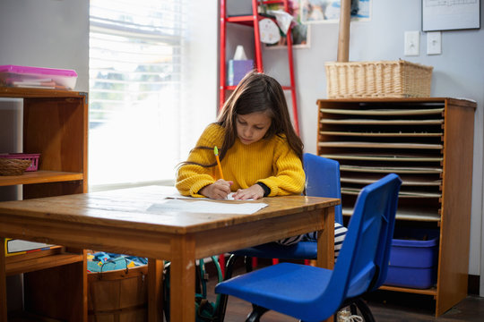 Students  in a classroom at a Montessori school.