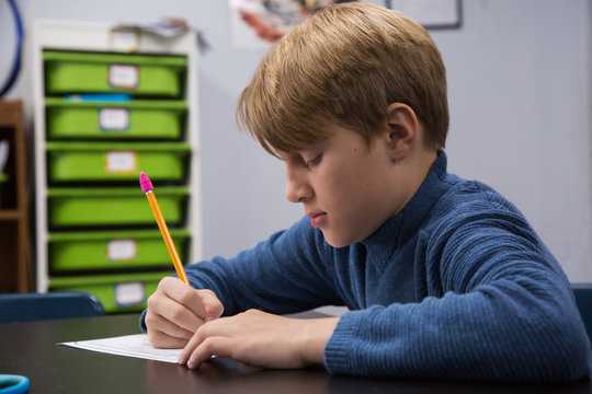 Boy in a classroom at school
