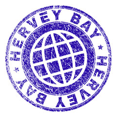 HERVEY BAY stamp imprint with grunge texture. Blue vector rubber seal imprint of HERVEY BAY label with retro texture. Seal has words placed by circle and globe symbol.