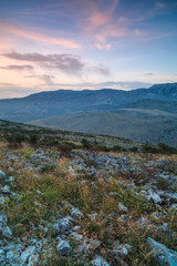 Sunset view in Croatian mountains,rocks and flowers,long exposure