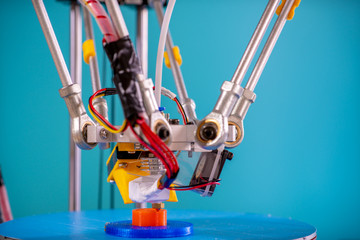 Print parts on a delta 3D printer in industrial lab