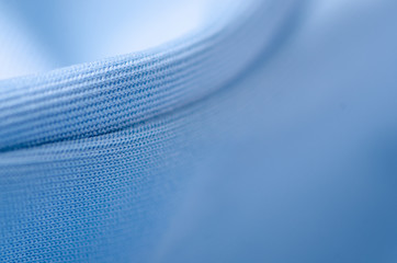 Blue fabric cloth macro clothing on blur background
