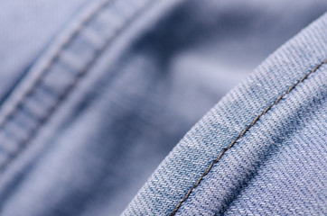 Blue gray jeans fabric macro texture fashion on blur background
