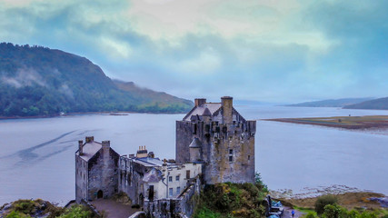 Fototapeta premium Eilean Donan Castle at Loch Duich in the Highlands of Scotland - aerial view
