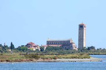 Ancient bell tower and church in the island called TORCELLO in I