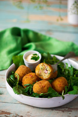 potato croquettes with mortadella.style rustic