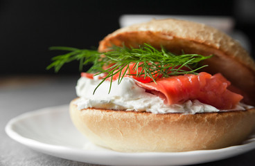Sandwich with salmon and cream cheese, macro closeup
