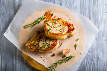 meat grilled rosemary spices wooden background
