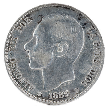 Ancient Spanish silver coin of the King Alfonso XII. 1 peseta. 1885, 18 85 in the stars. Obverse.