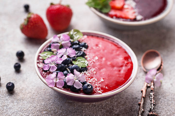 Smoothie bowls with strawberry and blueberry 