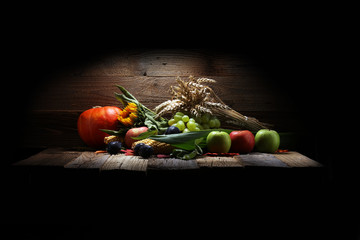 Autumn nature concept. Fall fruit and vegetables on wood. Thanksgiving dinner