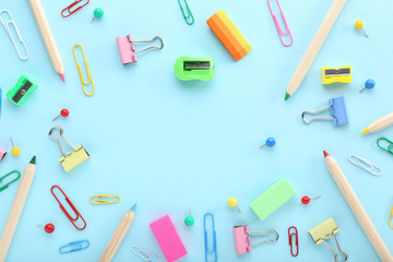School supplies on colorful background