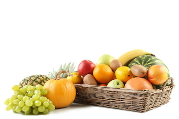 Different ripe fruits in basket on white background