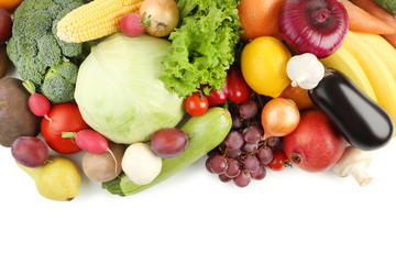 Ripe fruits and vegetables on white background